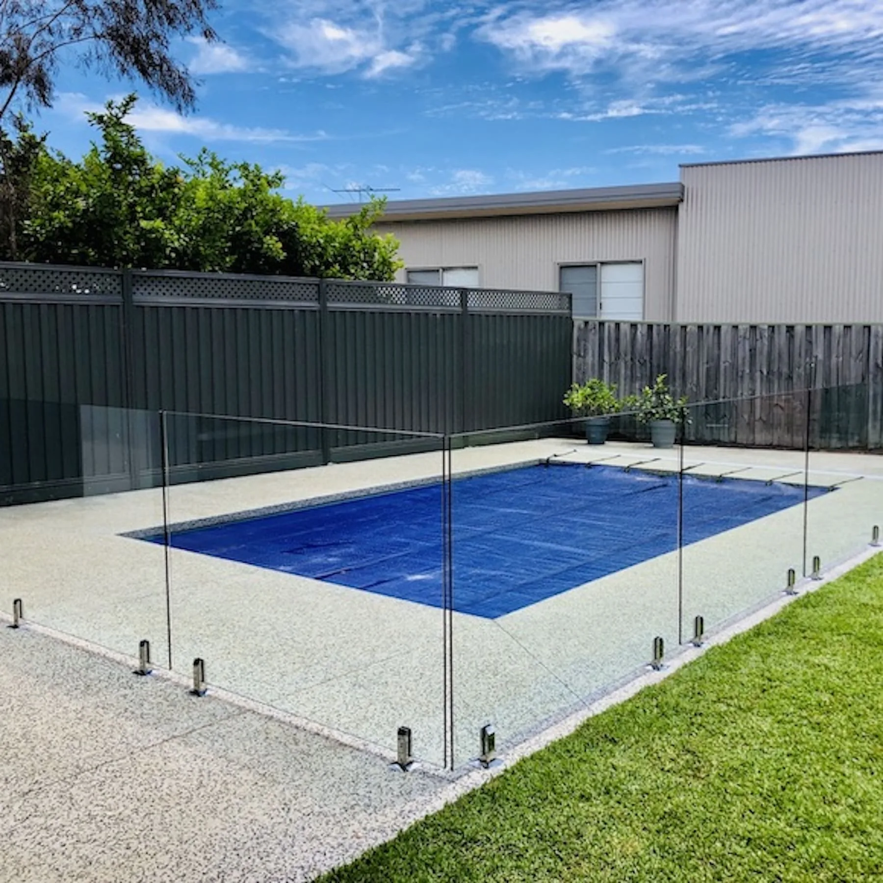 Glass pool fencing with slimline posts on the Gold Coast